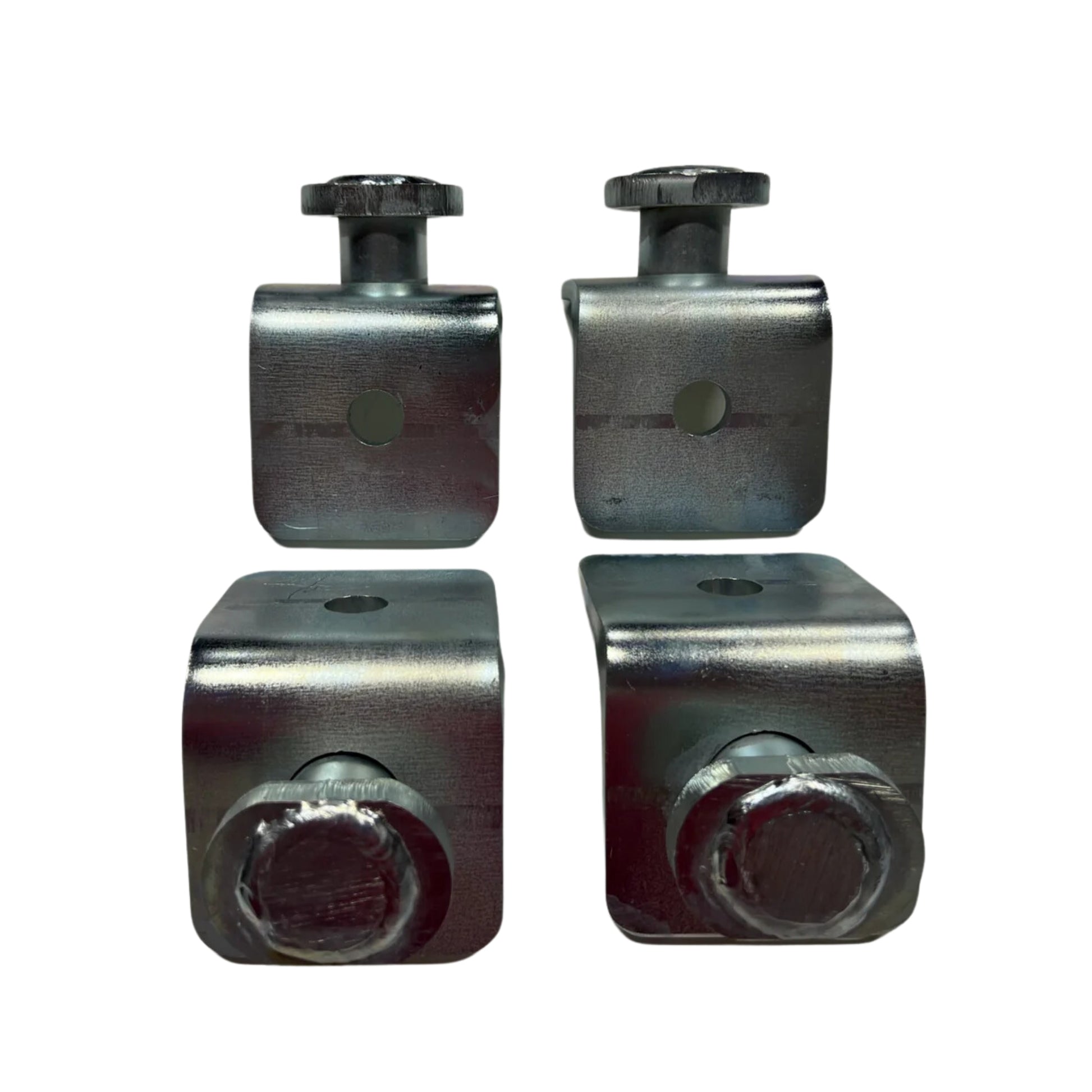 Four EZY Twist Locks by Container Nut, each featuring circular holes and attached bolts, are placed on a white background. The Twist Locks showcase a shiny, metallic finish.