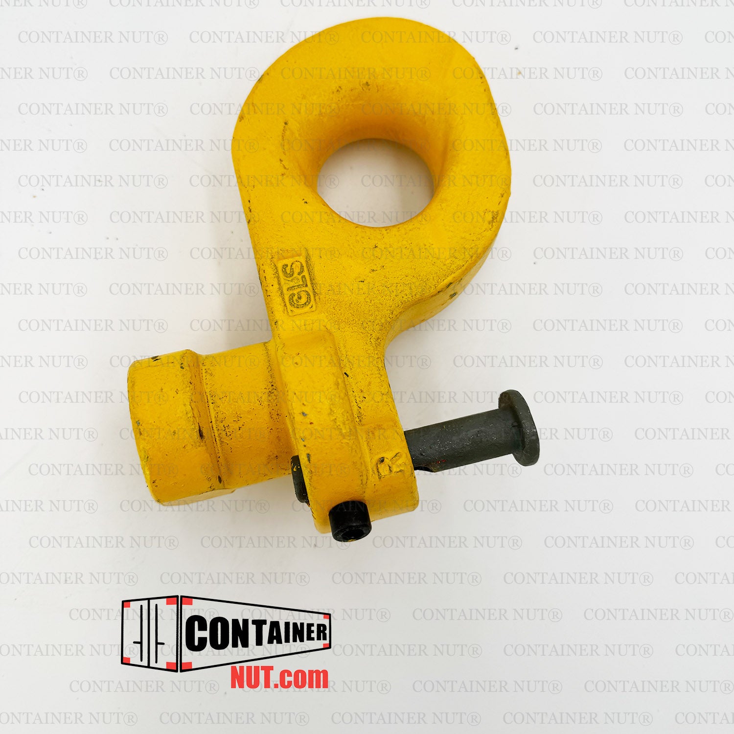 A yellow Bottom Lifting Lug, designed by Container Nut for securing shipping containers, with a cylindrical pin extending from its base. The background features a repeated watermark with the text "CONTAINER NUT®". The "CONTAINER NUT.COM" logo is also visible in the lower left corner.